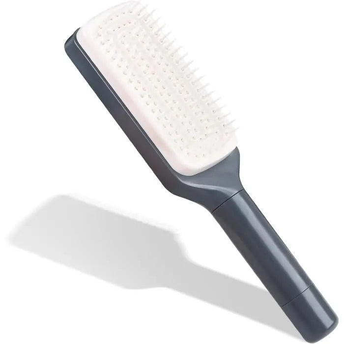 Brosse a cheveux autonettoyants