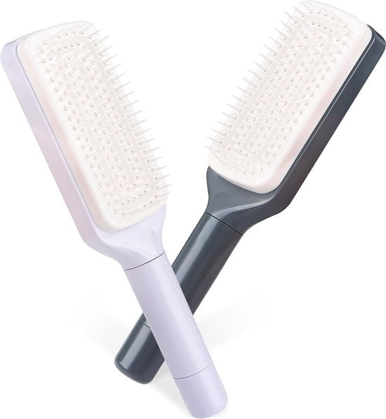 Brosse a cheveux autonettoyants